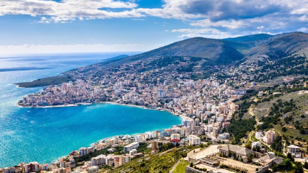 Aerial view of Saranda Albania town during lunch time with impressive mountain and seaviews