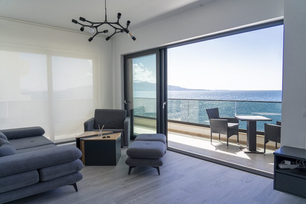 living room interior in golden beach residence showing corfu island views and the ionian sea in saranda