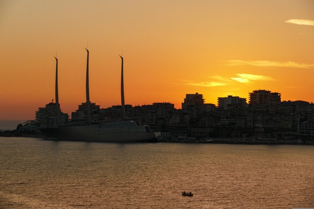 yacht parked in saranda board during sunset