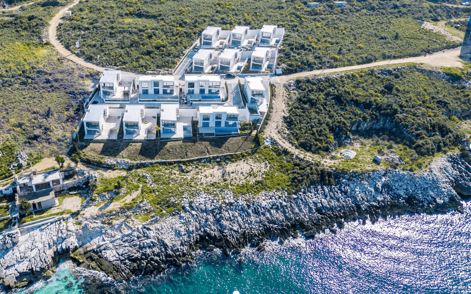 aerial view of palmera resort in saranda albania and the green surroundings and the ionian sea