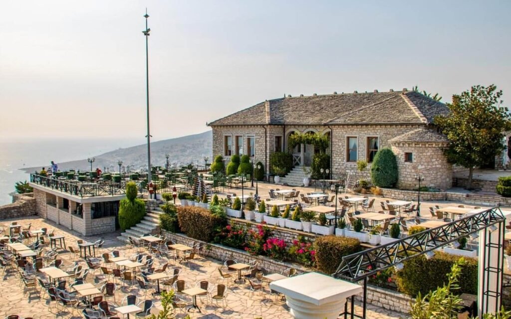 view of castle of lekursi in saranda albania as a medieval restaurant with saranda city views , sea and corfu island views